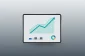 Minimalist tablet with unlabeled financial dashboard: rising line and bar charts on a soft gray background.